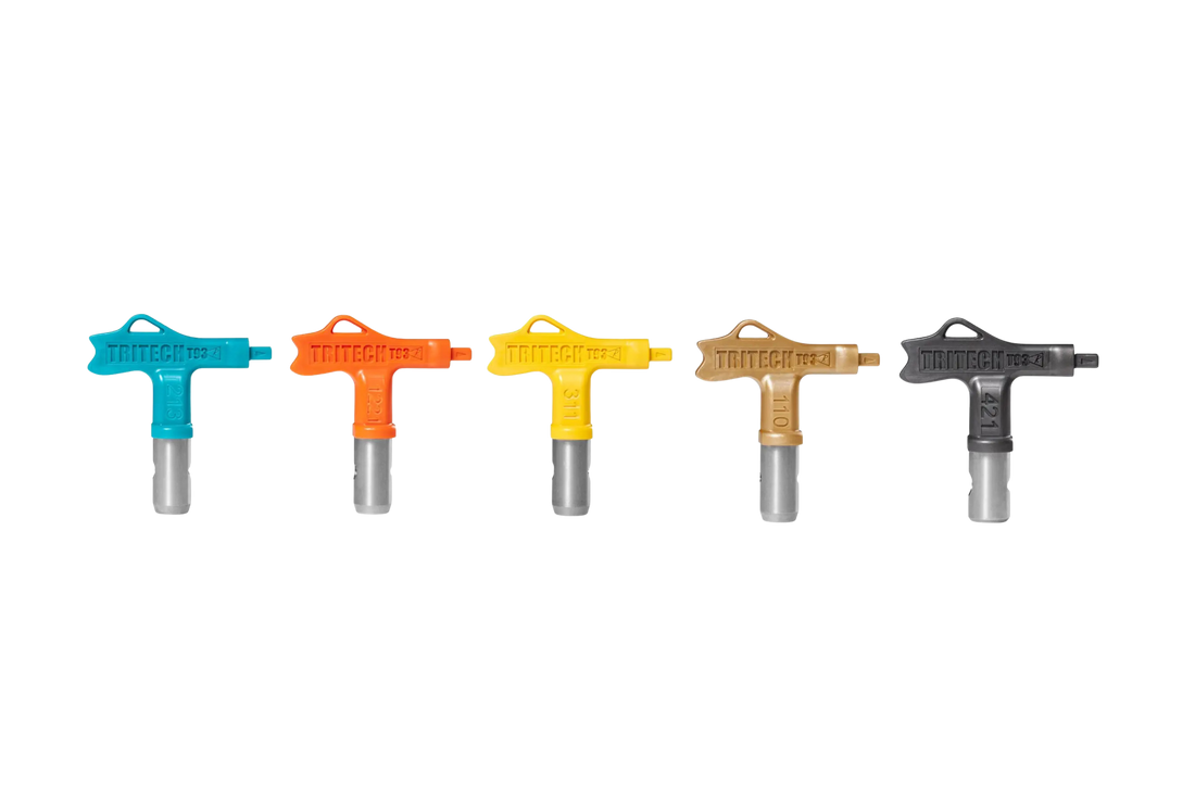 Lineup of five TriTech spray tips in different colors, representing Contractor, Wide-Fan, Sharp Liner, Ultra-Finish, and Maxx series for professional paint sprayers.