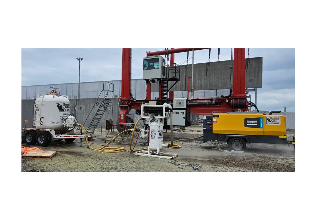 Air compressor in use at jobsite with blast equipment